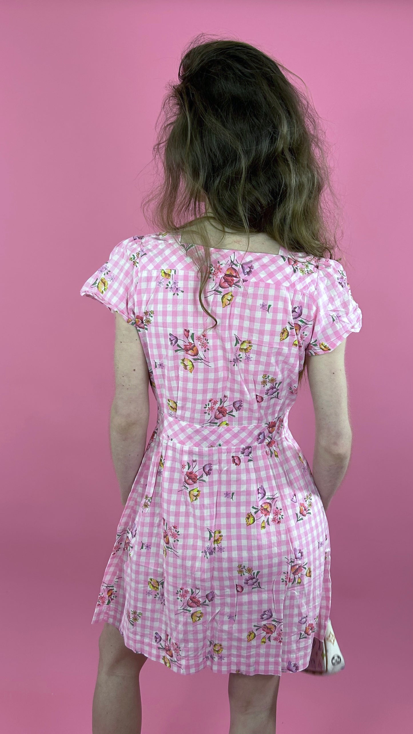 Robe rose à bouton