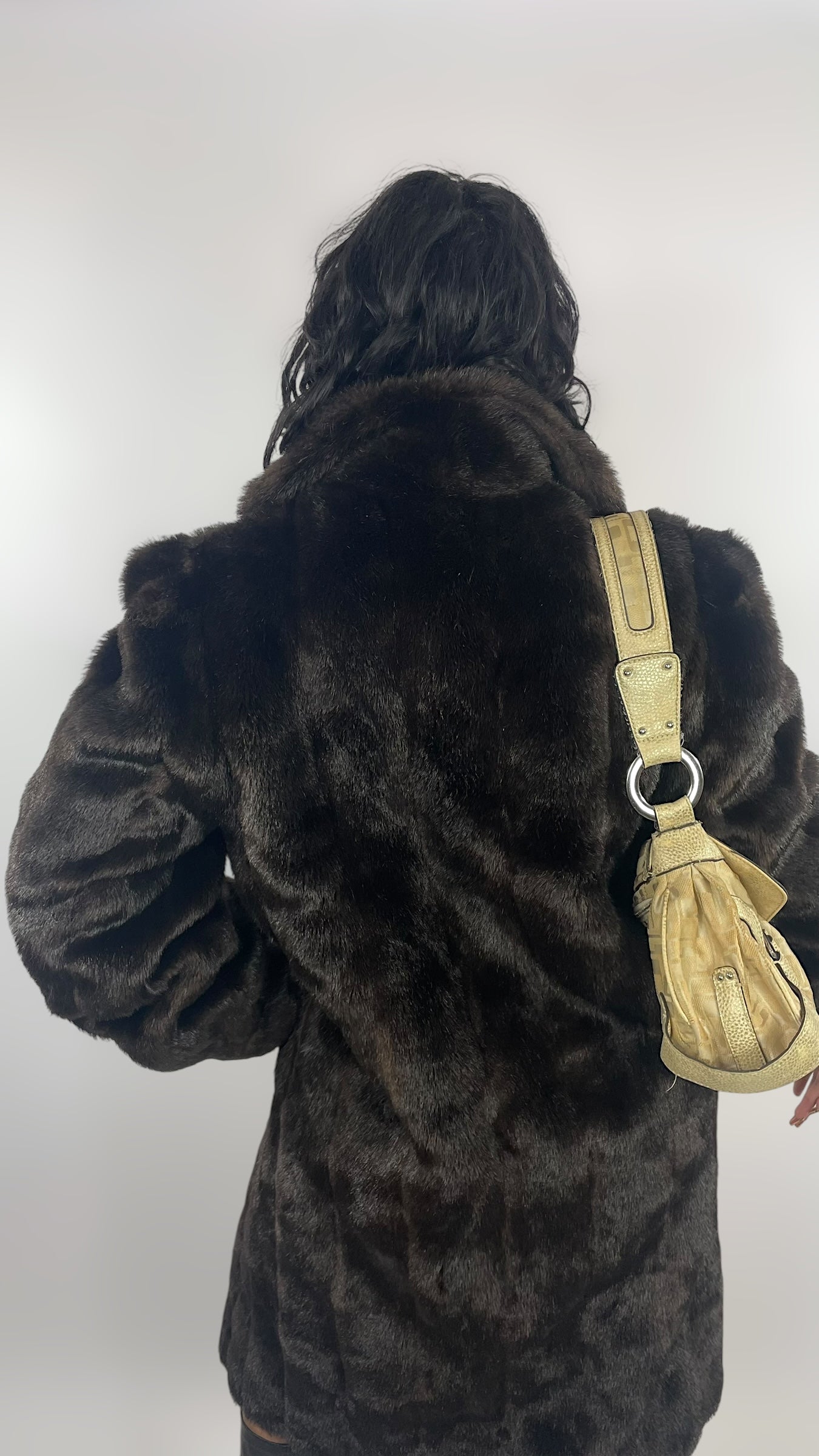 Manteau fausse fourrure