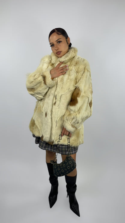 Manteau en fourrure tachetés